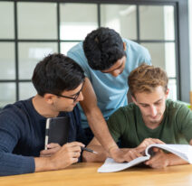 Serious students focused on class assignment